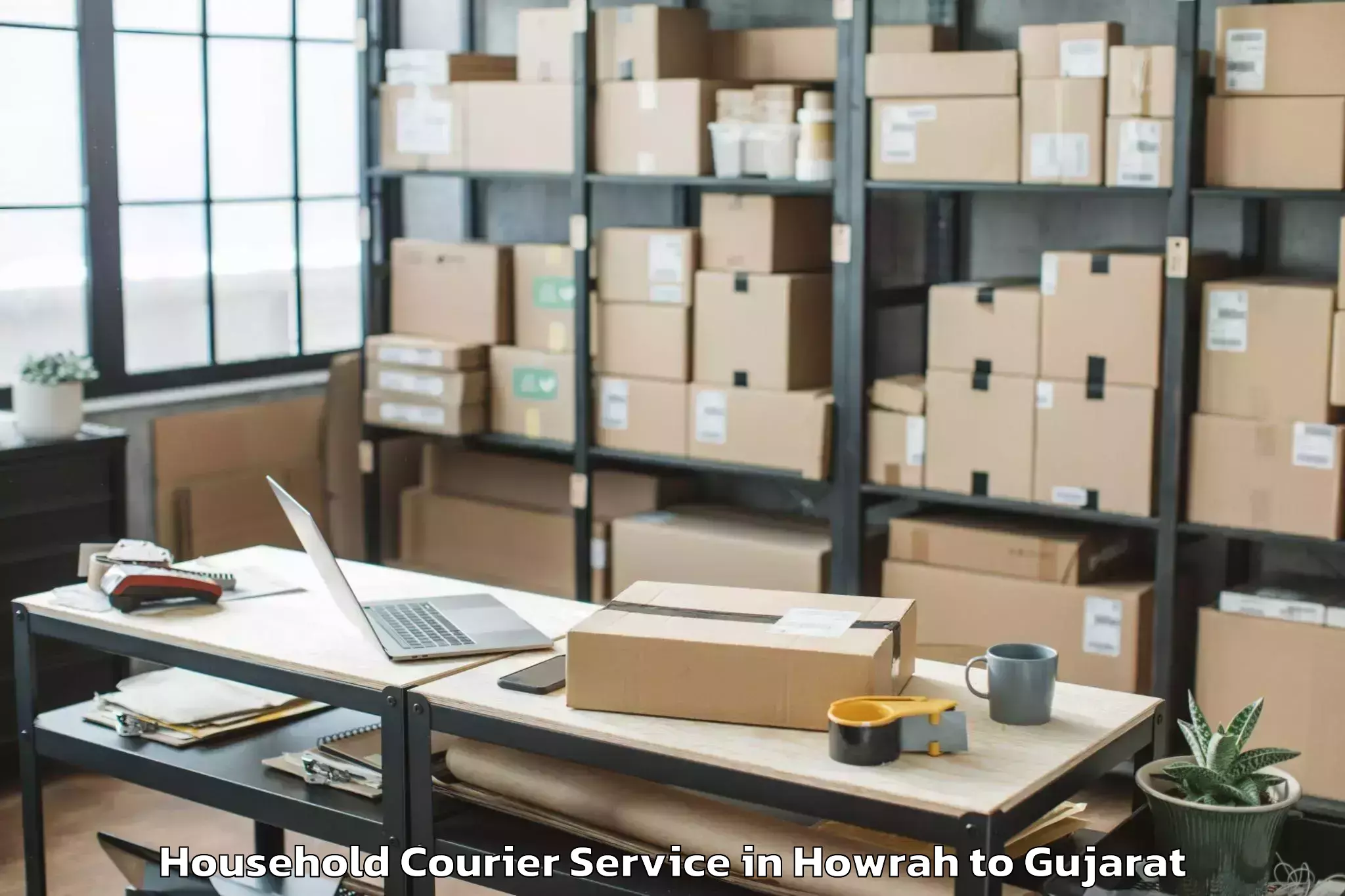 Top Howrah to Umargam Household Courier Available